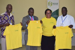 The NSSF team with the branding adjudicators handing over branded t-shirts to the winners at the Kenya Music Festivals. 